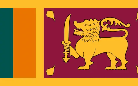 Flaga Sri Lanki z lwem i mieczem. Planujesz podróż? Sprawdź, czy potrzebna jest wiza Sri Lanka.